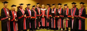 Dr. Marcia Boyd (C), UBC Dentistry professor emerita, joins newly inducted American College of Dentists Fellows following a ceremony in Honolulu, Hawaii. UBC Dentistry faculty members include: Drs. Jeffrey Coil (L), Virginia Diewert (2nd L) and Christopher Zed (4th L). Others pictured are newly inducted BC dentists.