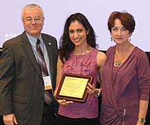 Leila Mohazab (C) receives her award from Dr. Jeff Dixon, CADR past-president, and Dr. Deborah Matthews, CADR president-elect.