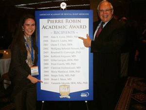Dr. Fernanda Almeida, 2011 recipient of the Pierre Robin Academic Award, is seen with UBC Dentistry professor
Dr. Alan Lowe, the first recipient of the award in 1999.